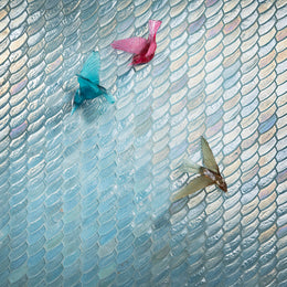 Featured art wall with Luce Feather in Mineral Springs Pearl and glass bird sculptures by Lunada Bay Tile